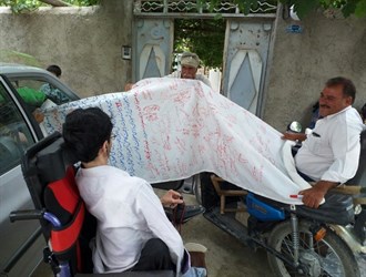 طومار معلولان خطاب به رئیس جمهور رونمایی شد